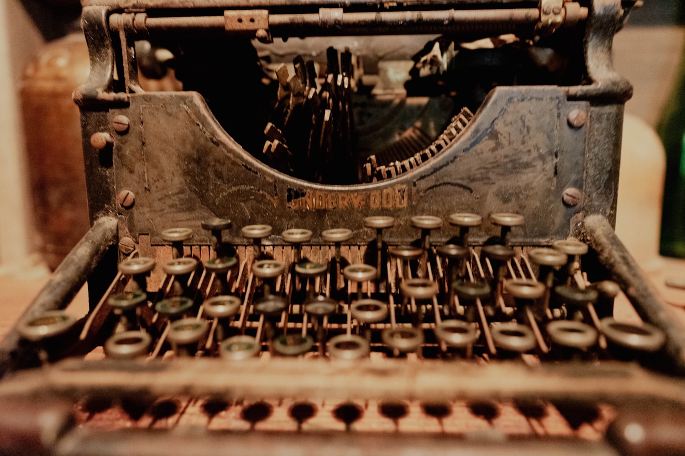 A close-up of an old typewriter, a machine built perfectly for a job that stopped existing