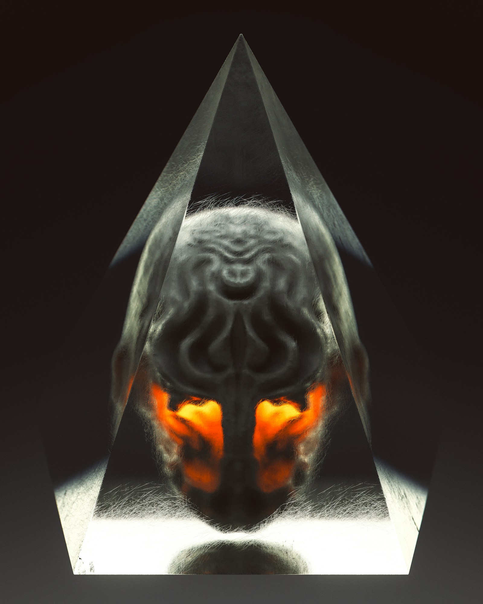 Surreal metallic face with glowing eyes and geometric forms